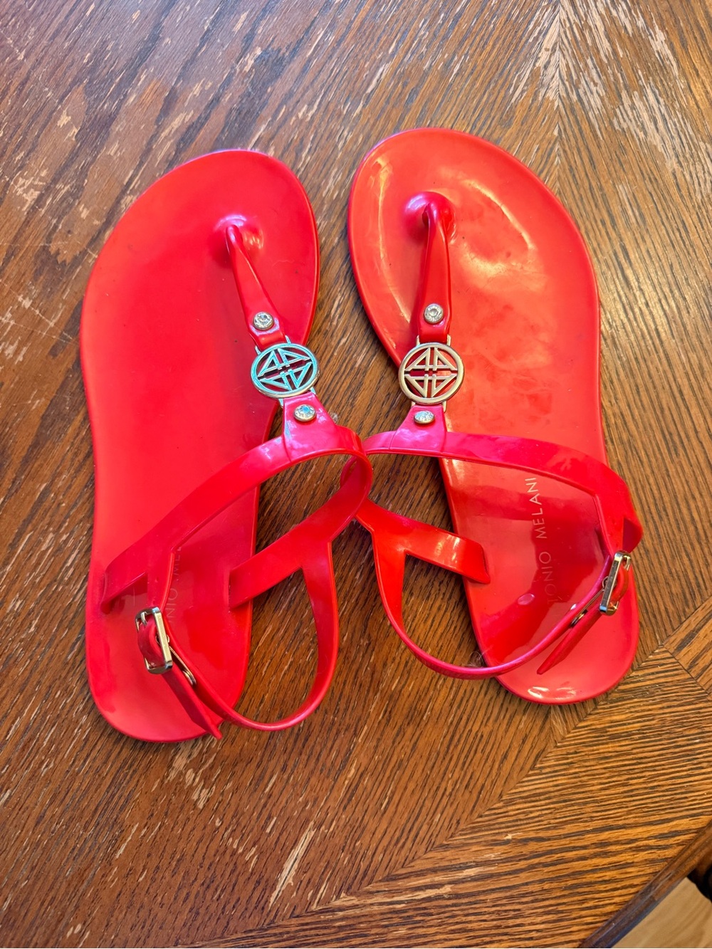 ANTONIO MELANI Glossy Red T-Strap Sandals with Logo Medallion